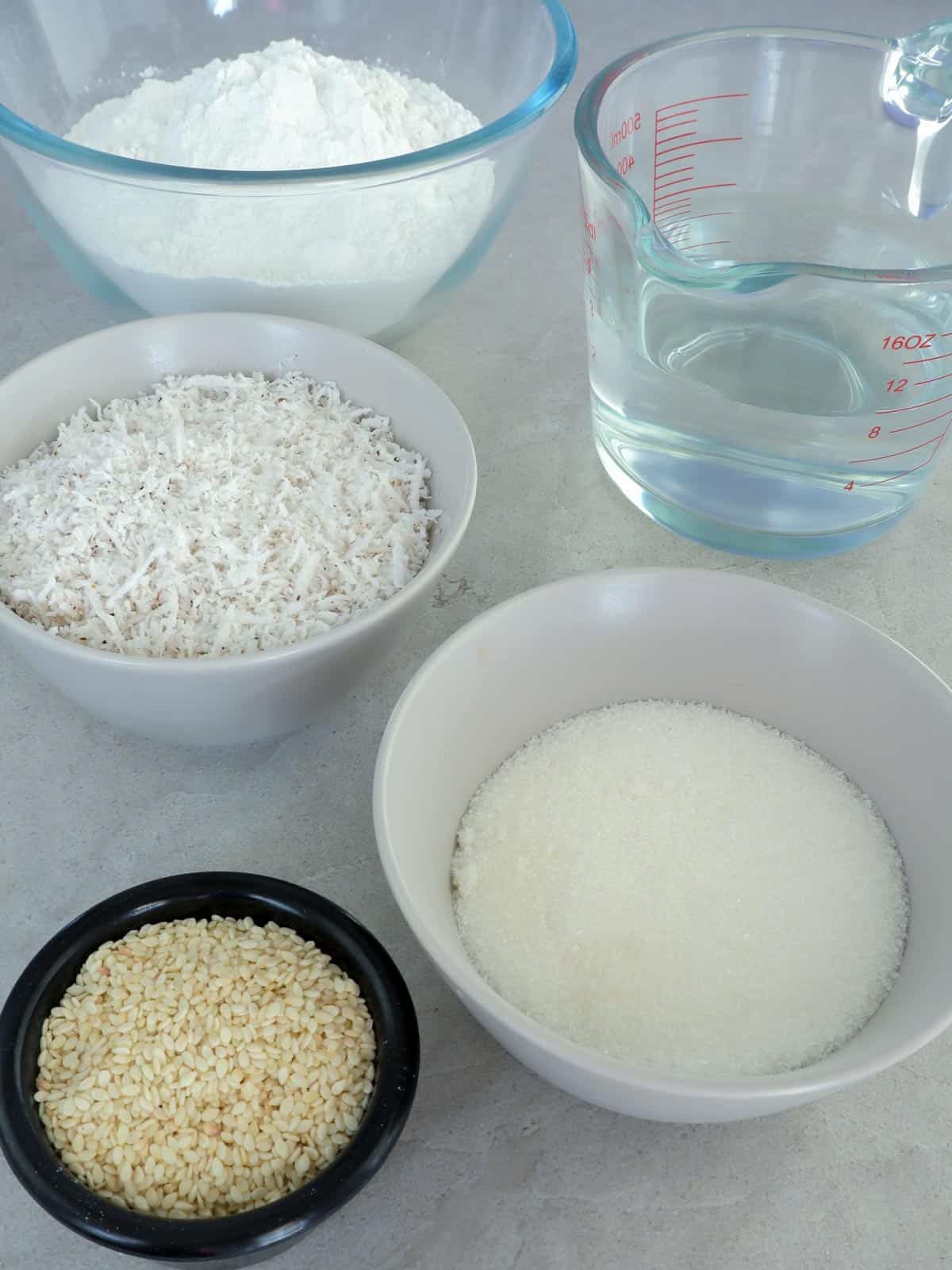 glutinous ride flour, sugar, sesame seeds, grated coconut, water