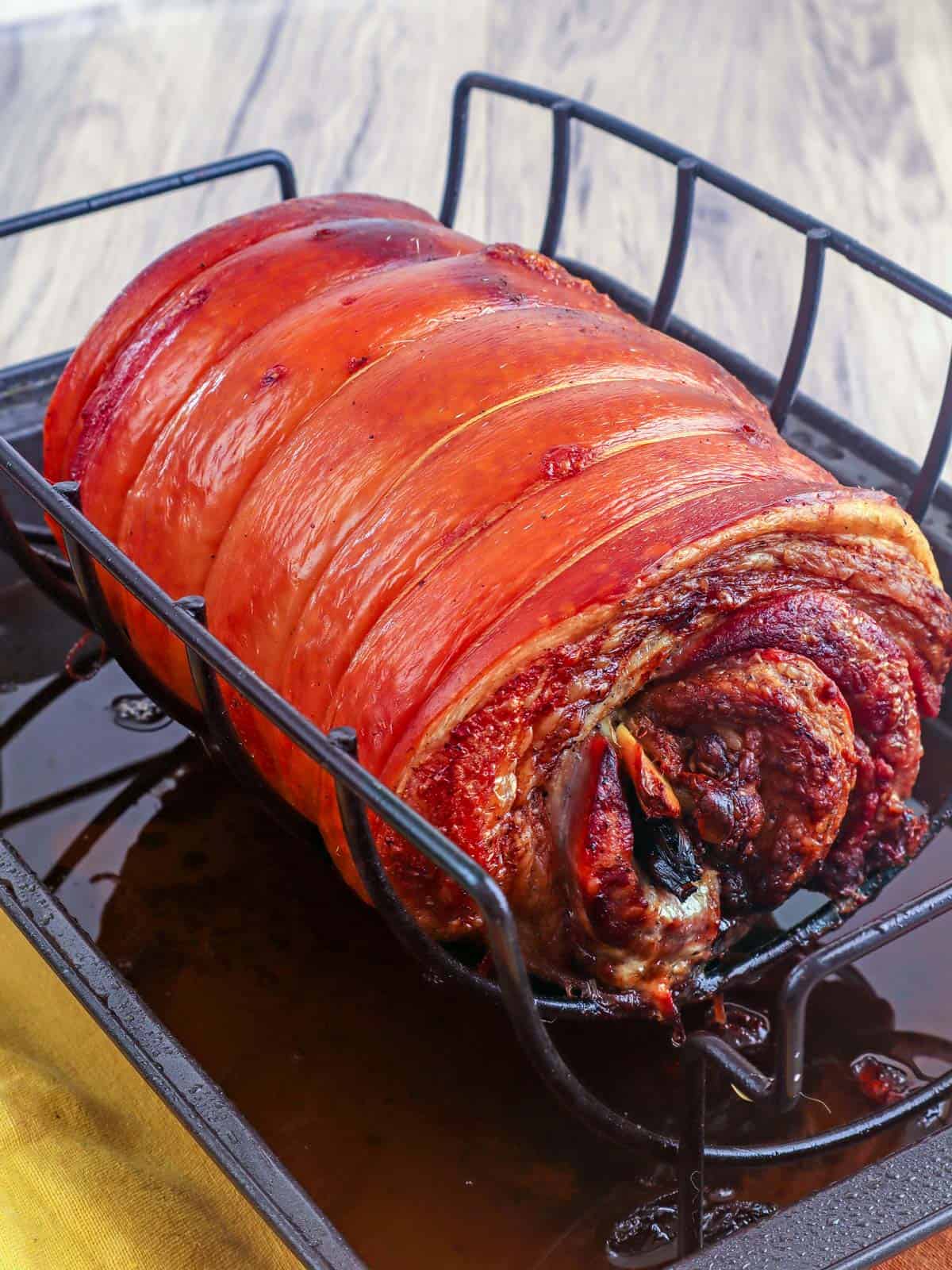 crispy oven-roasted pork belly on a roasting rack