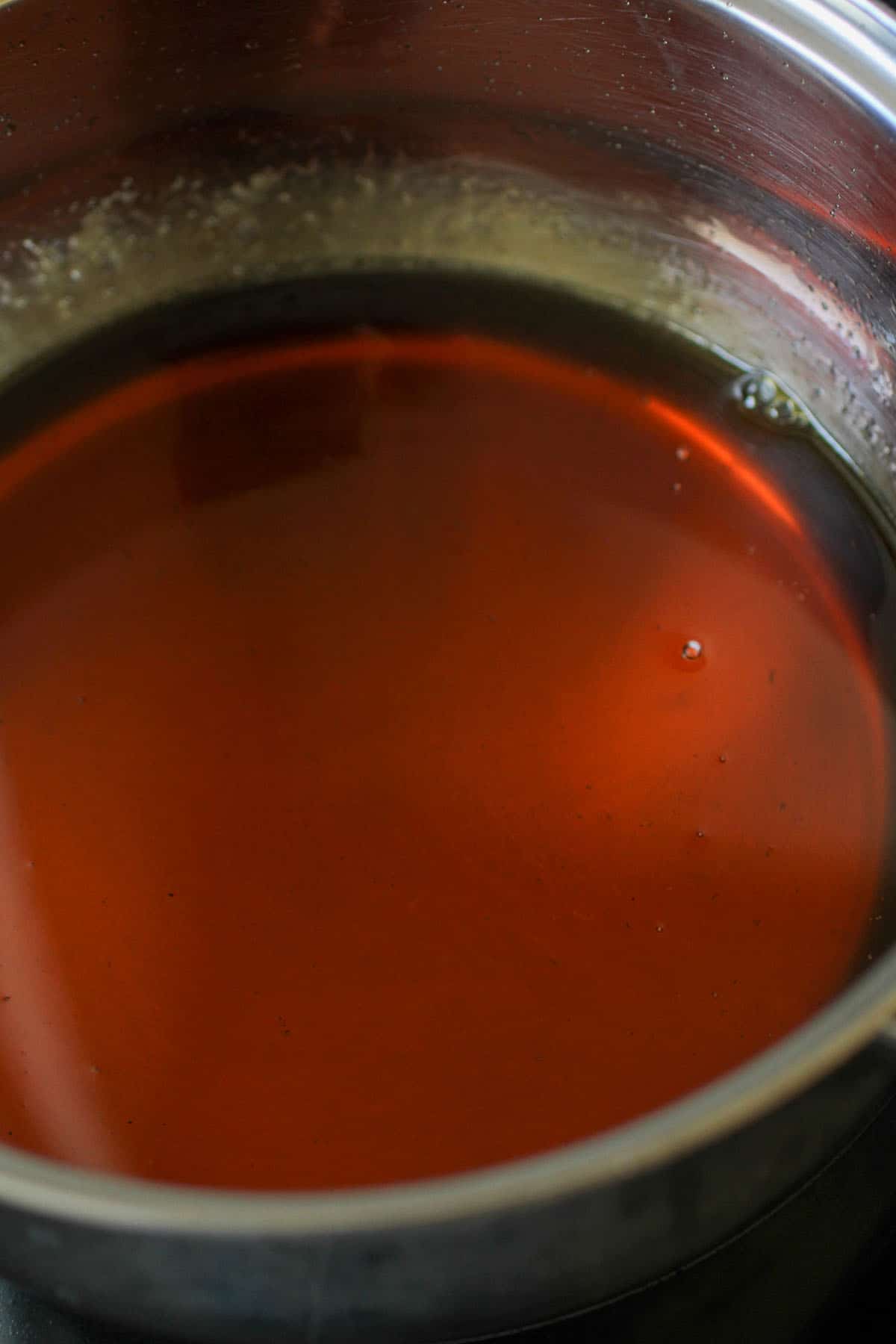 simple syrup in a saucepot