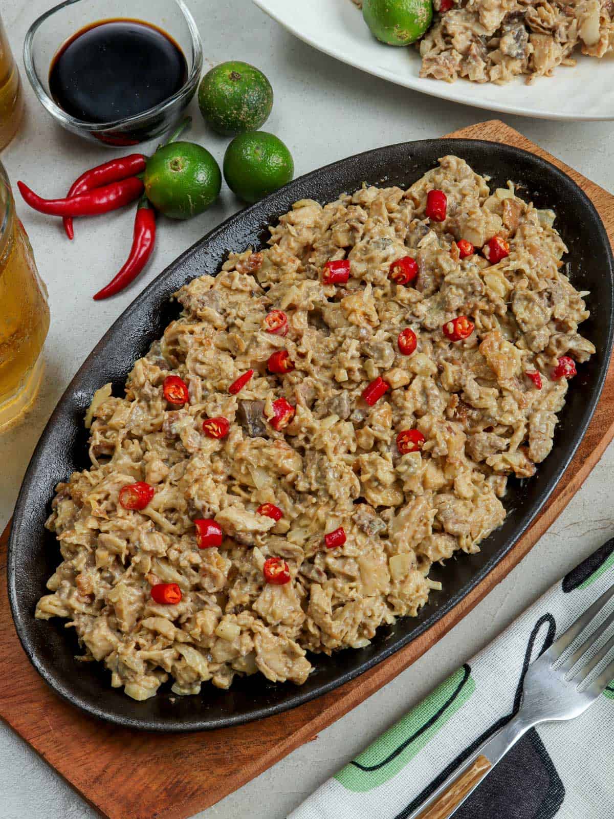 Chicken Sisig on a metal plate