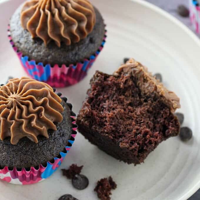 Moist Chocolate Cupcakes with Mocha Buttercream Frosting on a white plate