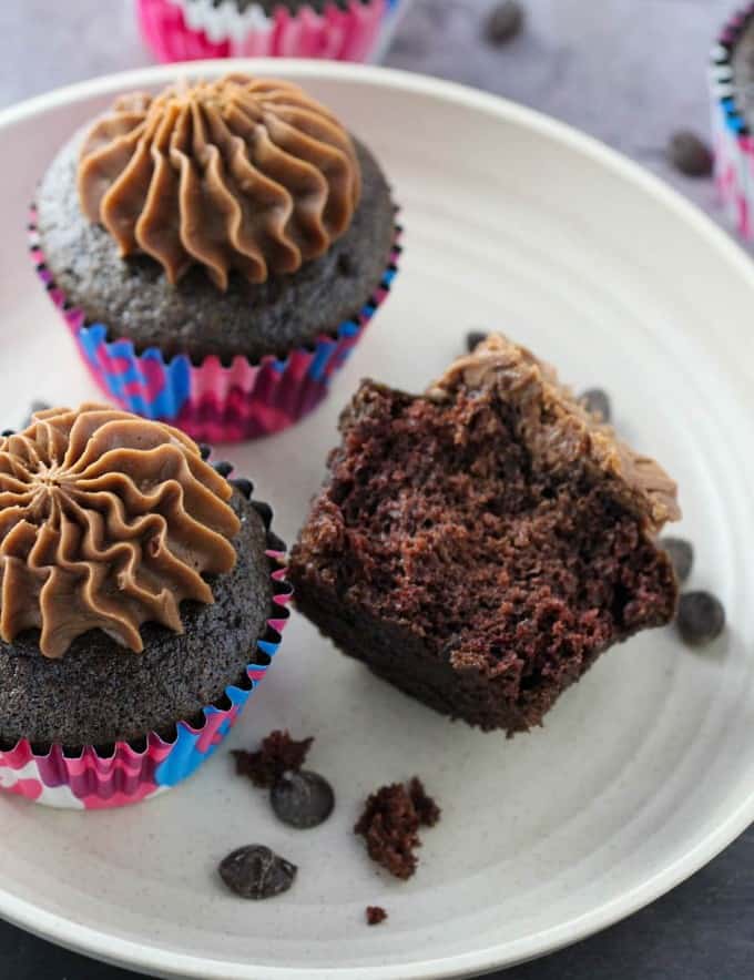 Moist Chocolate Cupcakes with Mocha Buttercream Frosting on a white plate