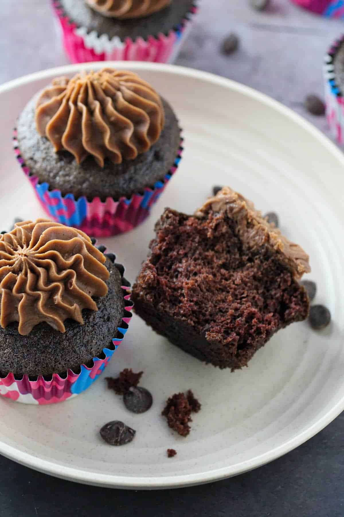 Moist Chocolate Cupcakes with Mocha Buttercream Frosting on a white plate