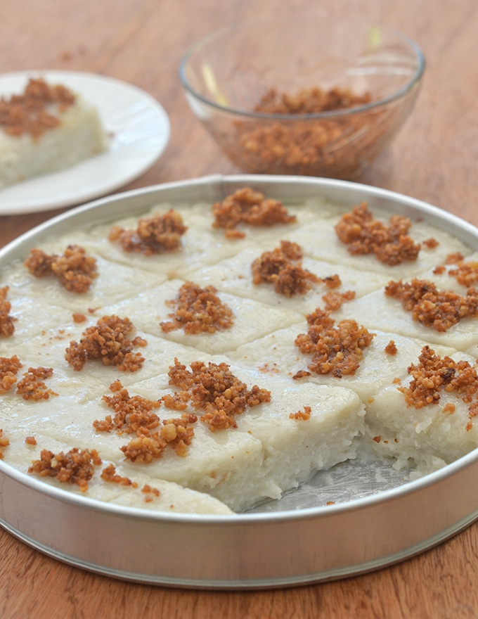 This thick Filipino rice cake topped with a crispy crunch is served in square slices. 