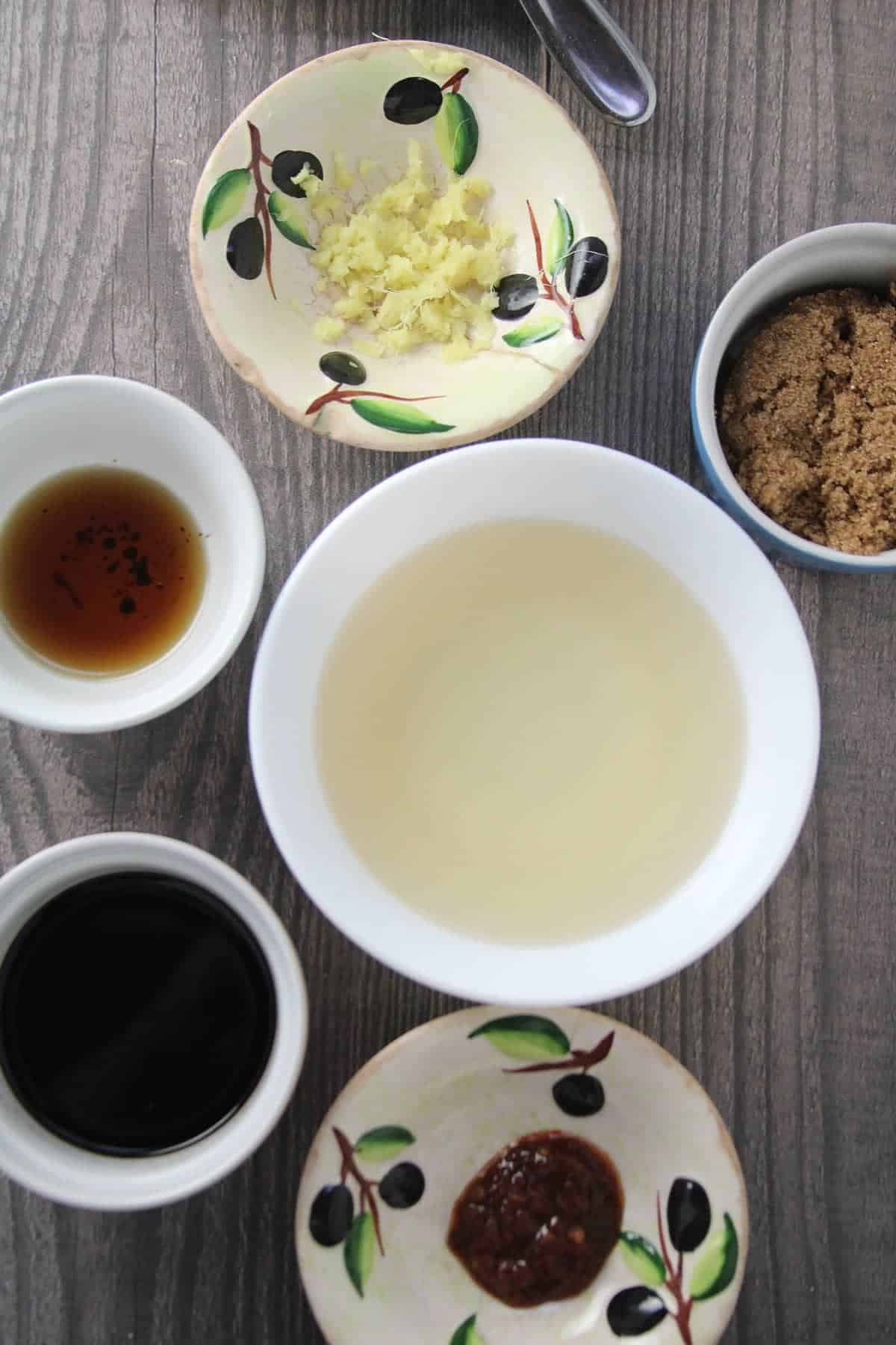 ingredients for Asian Sesame Dressing in small bowls