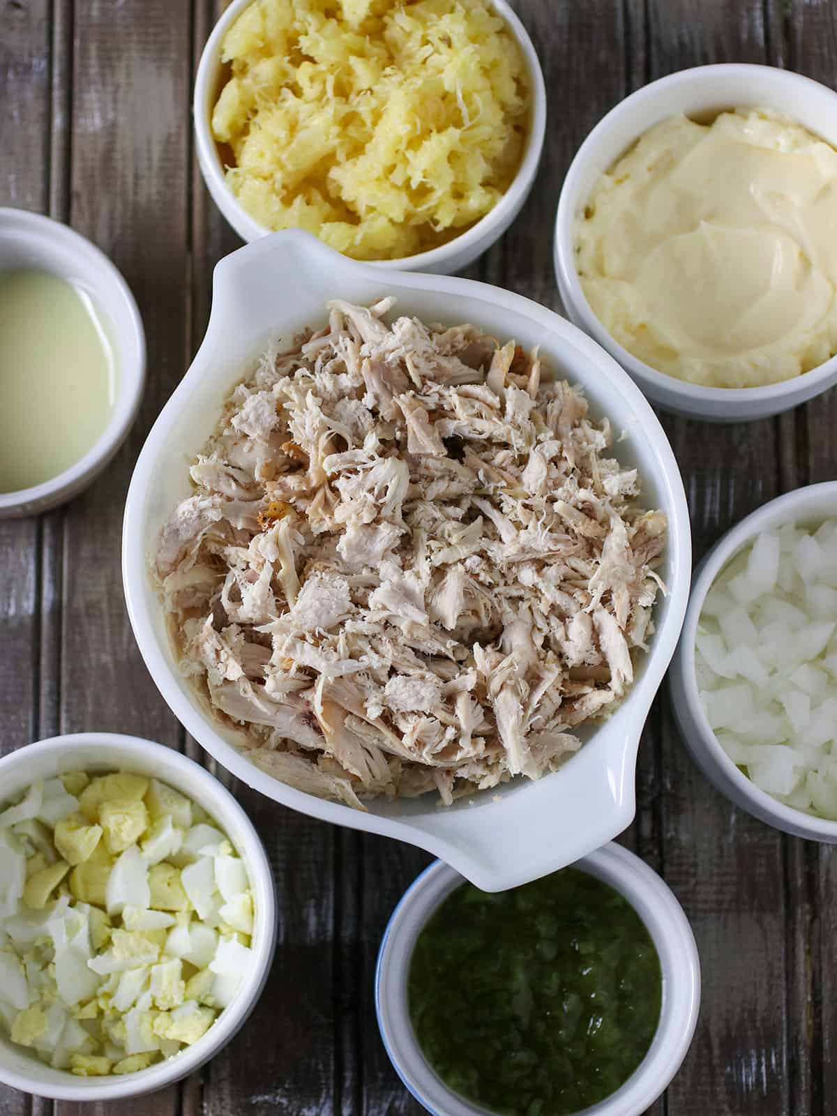 shredded chicken, chopped eggs, crushed pineapple, sweet relish in bowls