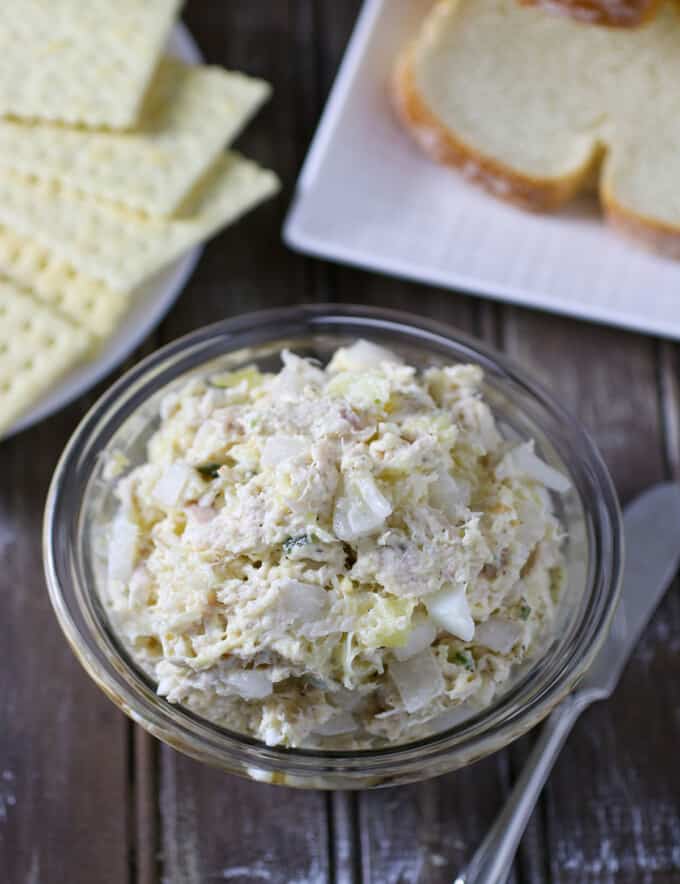 Chicken Salad Sandwich Spread in bowl with sliced bread on the side