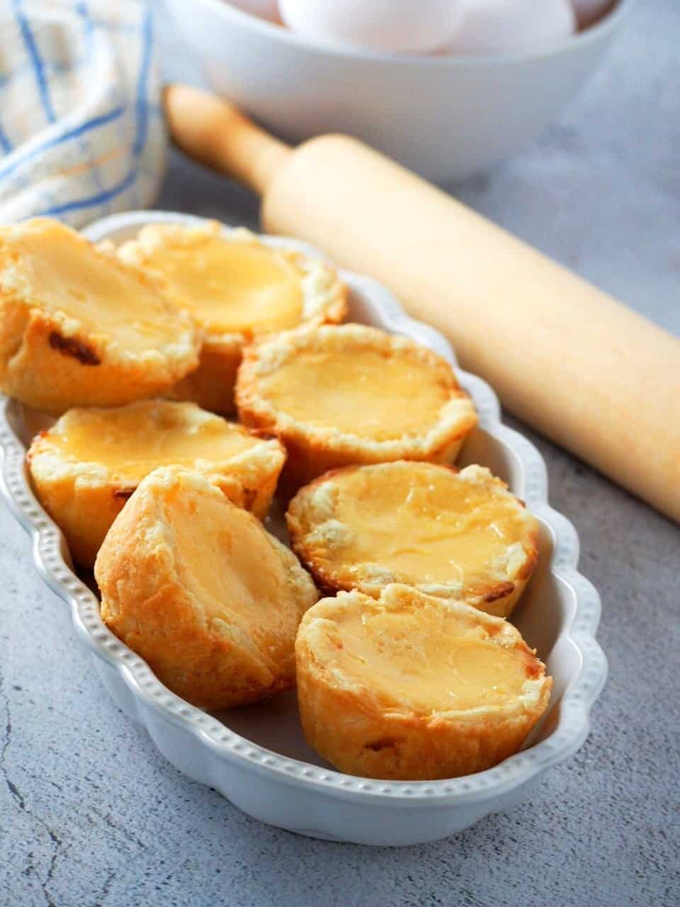 mini custard pies in a white dish