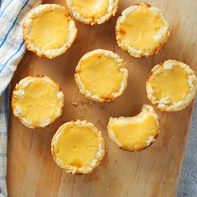 Mini egg pies on a cutting board