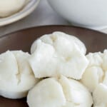 puto on a wooden serving plate.