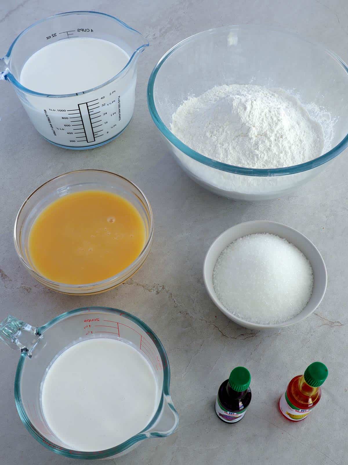 glutinous rice flour, condensed milk, coconut milk, coconut cream, sugar, flavor extracts in bowls.