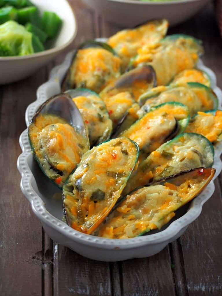 baked tahong in a white rectangle serving dish