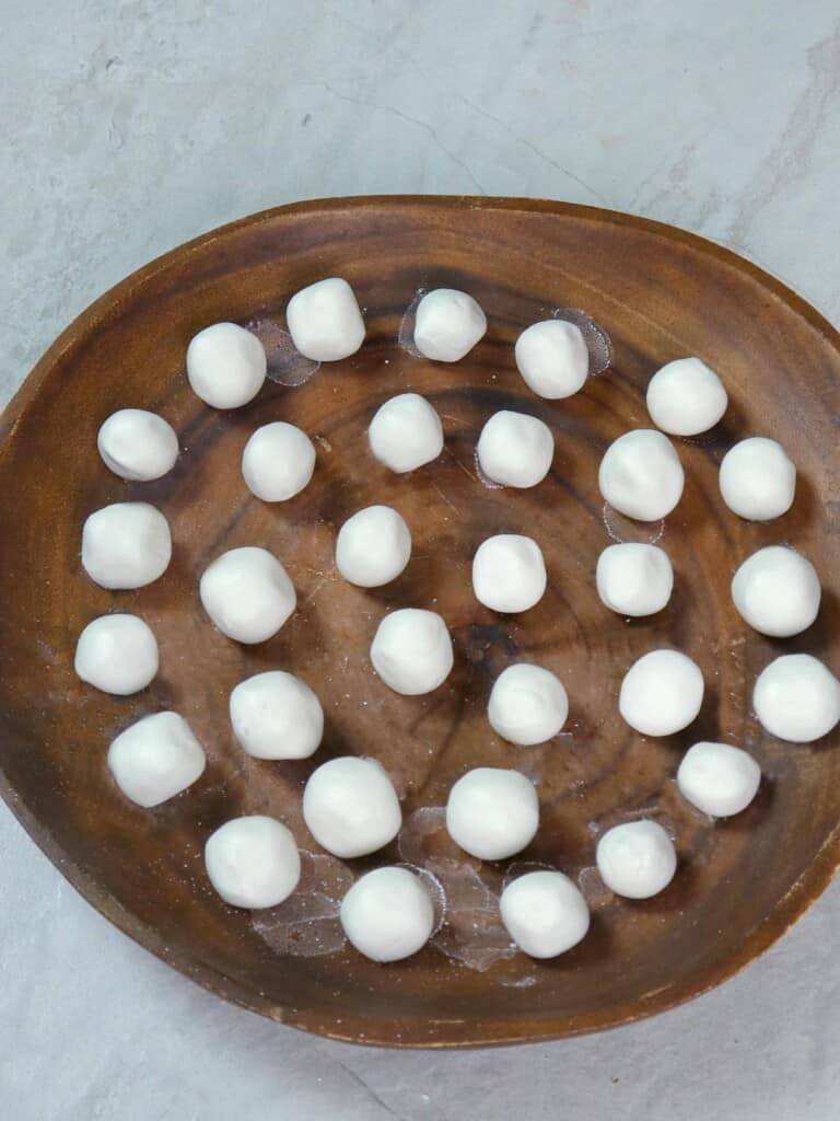 glutinous rice balls on a wooden plate