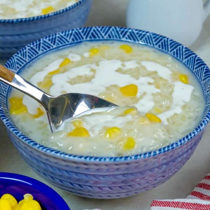 eating ginataang mais with a spoon.