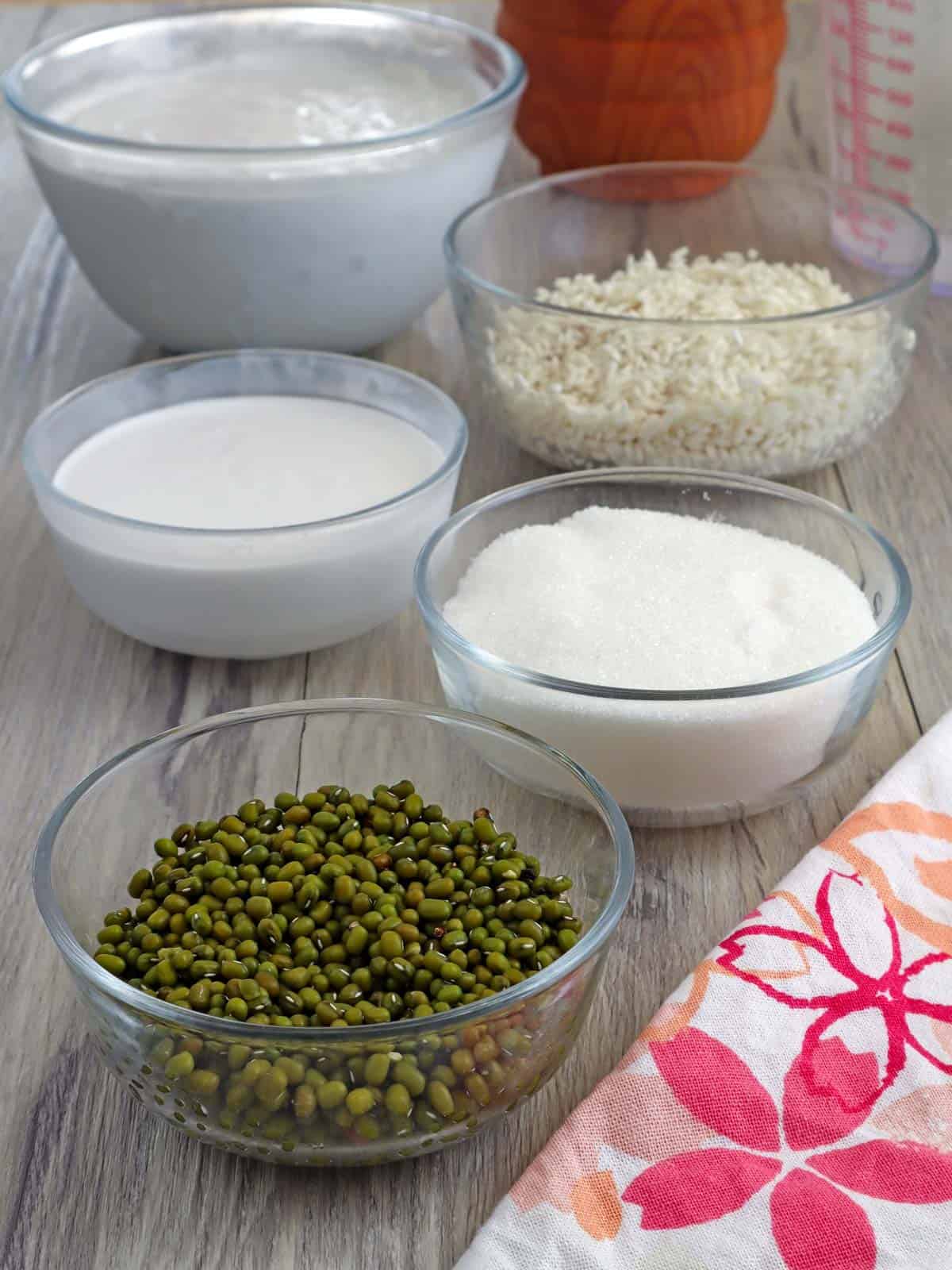 mung beans, glutinous rice, coconut milk, sugar, coconut cream, water in bowls