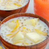 cassava in coconut cream with sago and jackfruit in wooden bowls
