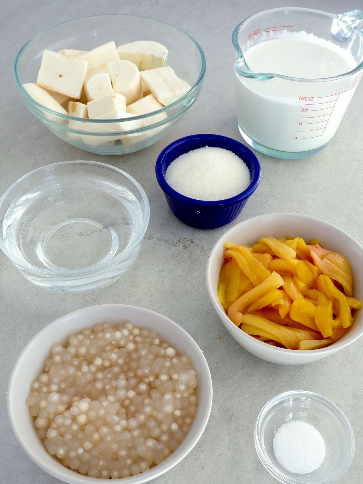 peeled cassava, cooked mini sago, salt, sugar, coconut cream, jackfruit strips, water