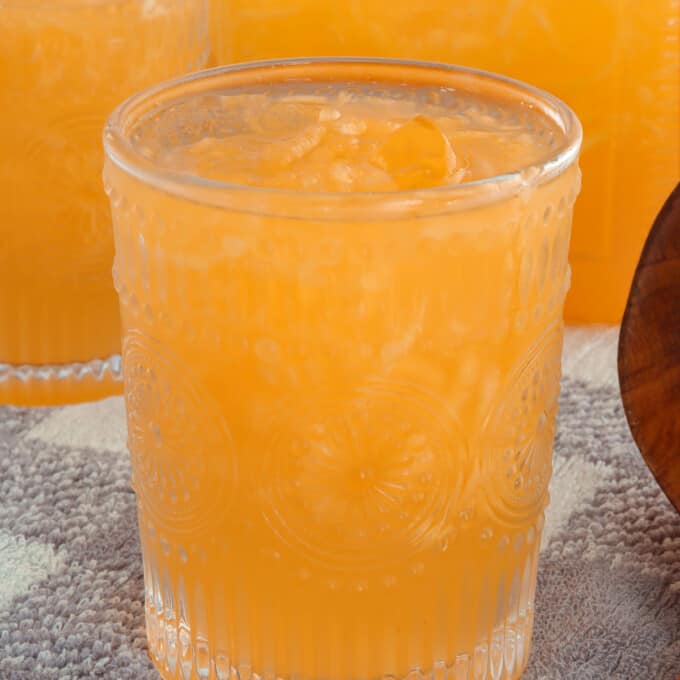 melon juice in a drinking glasses with ice