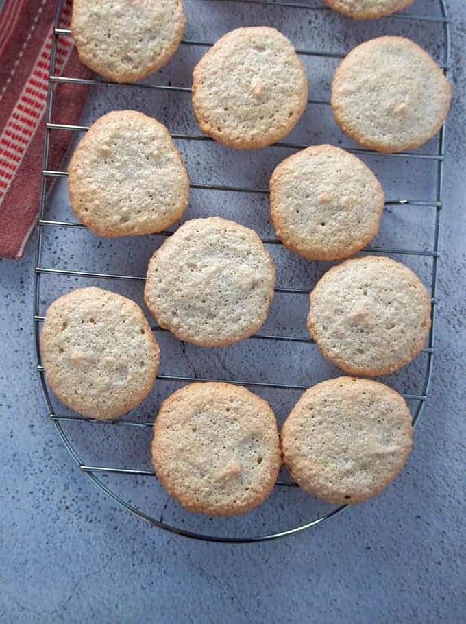 meringue cookies on a cooling rack