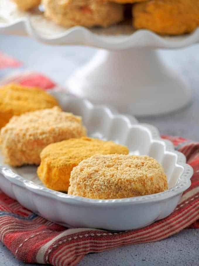 Filipino sylvanas cookies with ground cashew and graham cracker crumb coating on serving platter