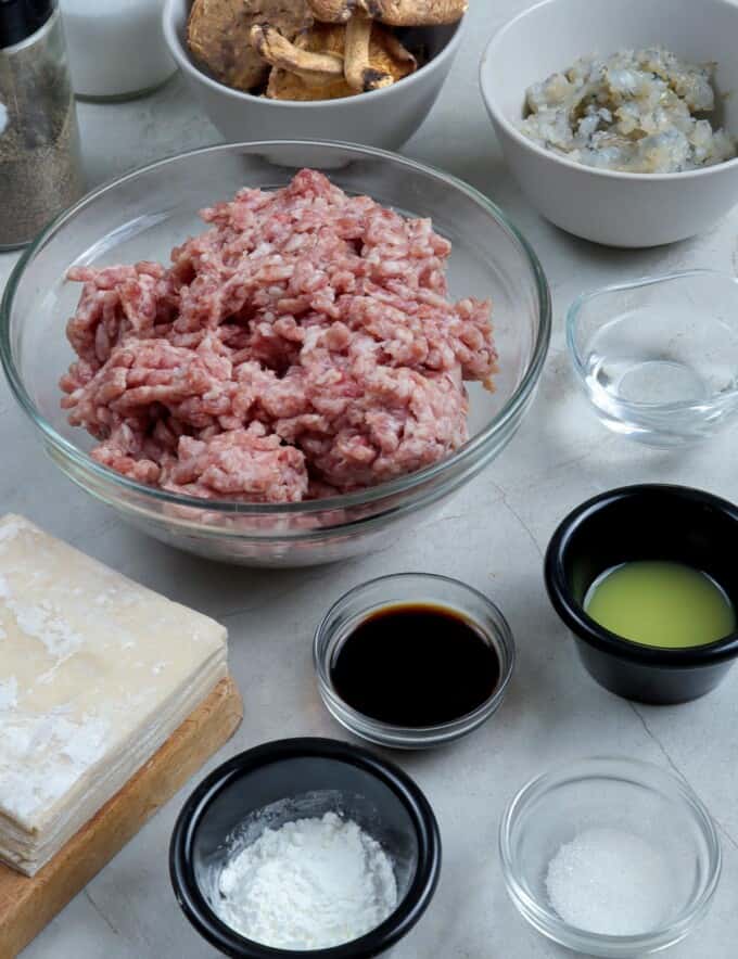 ground pork, cornstarch, soy sauce, shitake mushrooms, minced shrimp, ginger juice, shumai wrappers