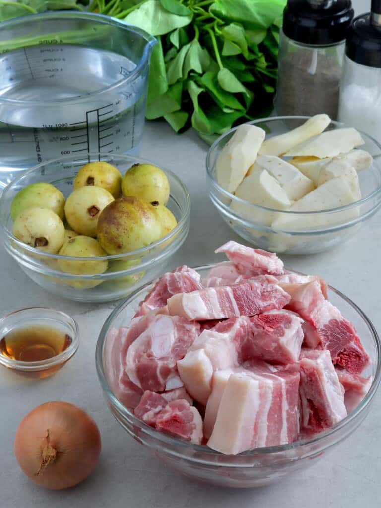 guavas, pork belly, gabi, kangkong, fish sauce, onion, water