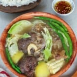 beef nilaga in a wooden serving bowl