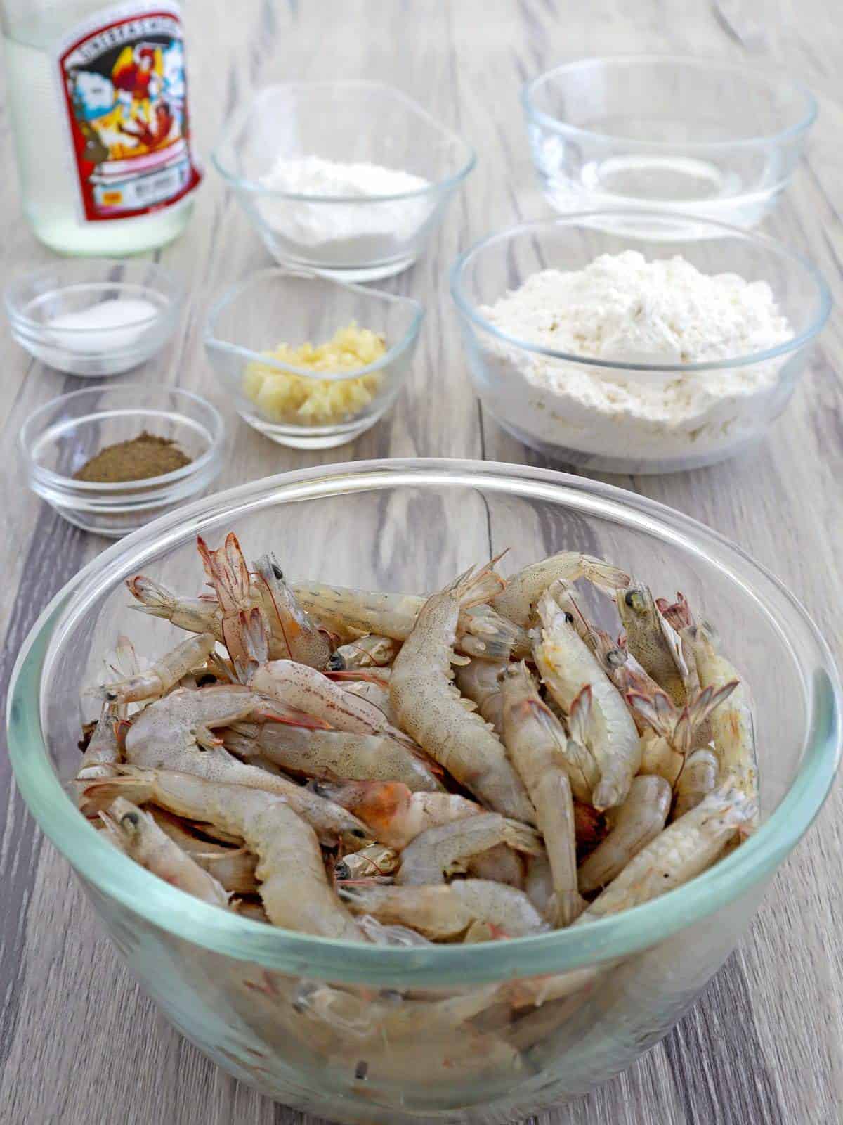 shell-on shrimp, flour, cornstarch, minced garlic, salt, pepper, gin