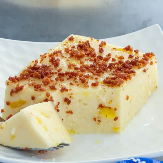 slice of maja langka and a fork on a white serving plate