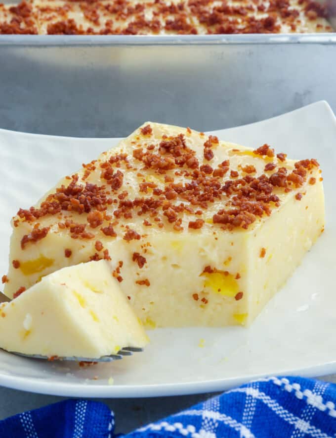 slice of maja langka and a fork on a white serving plate