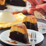 slices of Impossible Chocolate Flan Cake on white serving plates