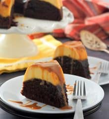 slices of Impossible Chocolate Flan Cake on white serving plates