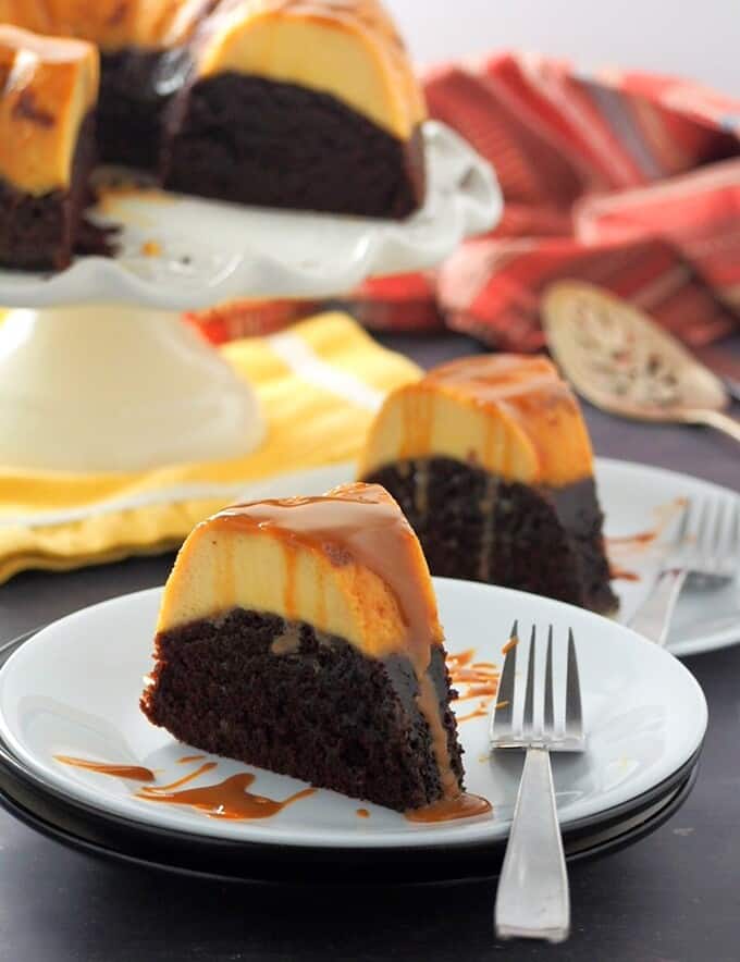 slices of Impossible Chocolate Flan Cake on white serving plates