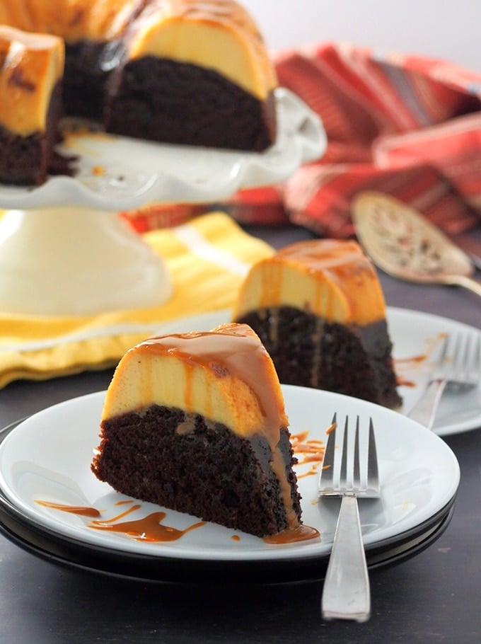 slices of Impossible Chocolate Flan Cake on white serving plates