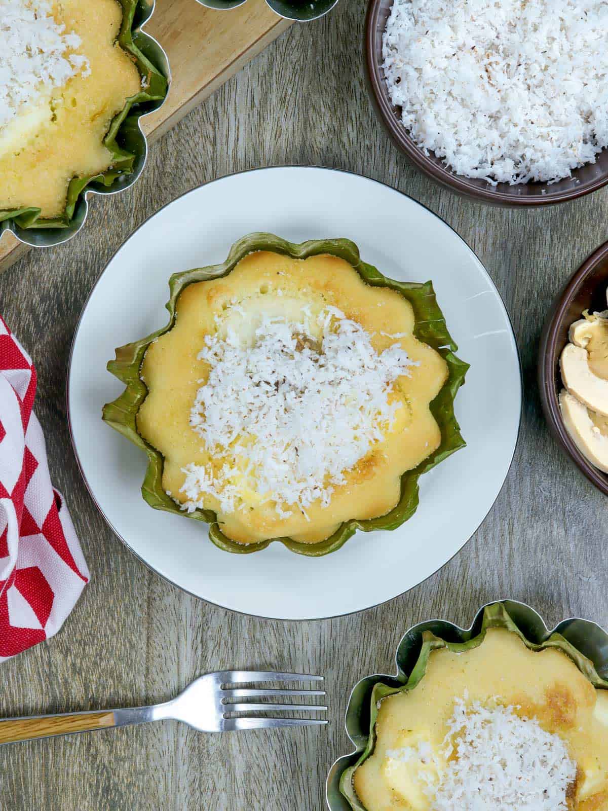 Bibingkang Galapong with grated coconut on a serving plate