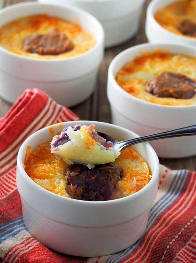 serving cassava ube cake with a spoon