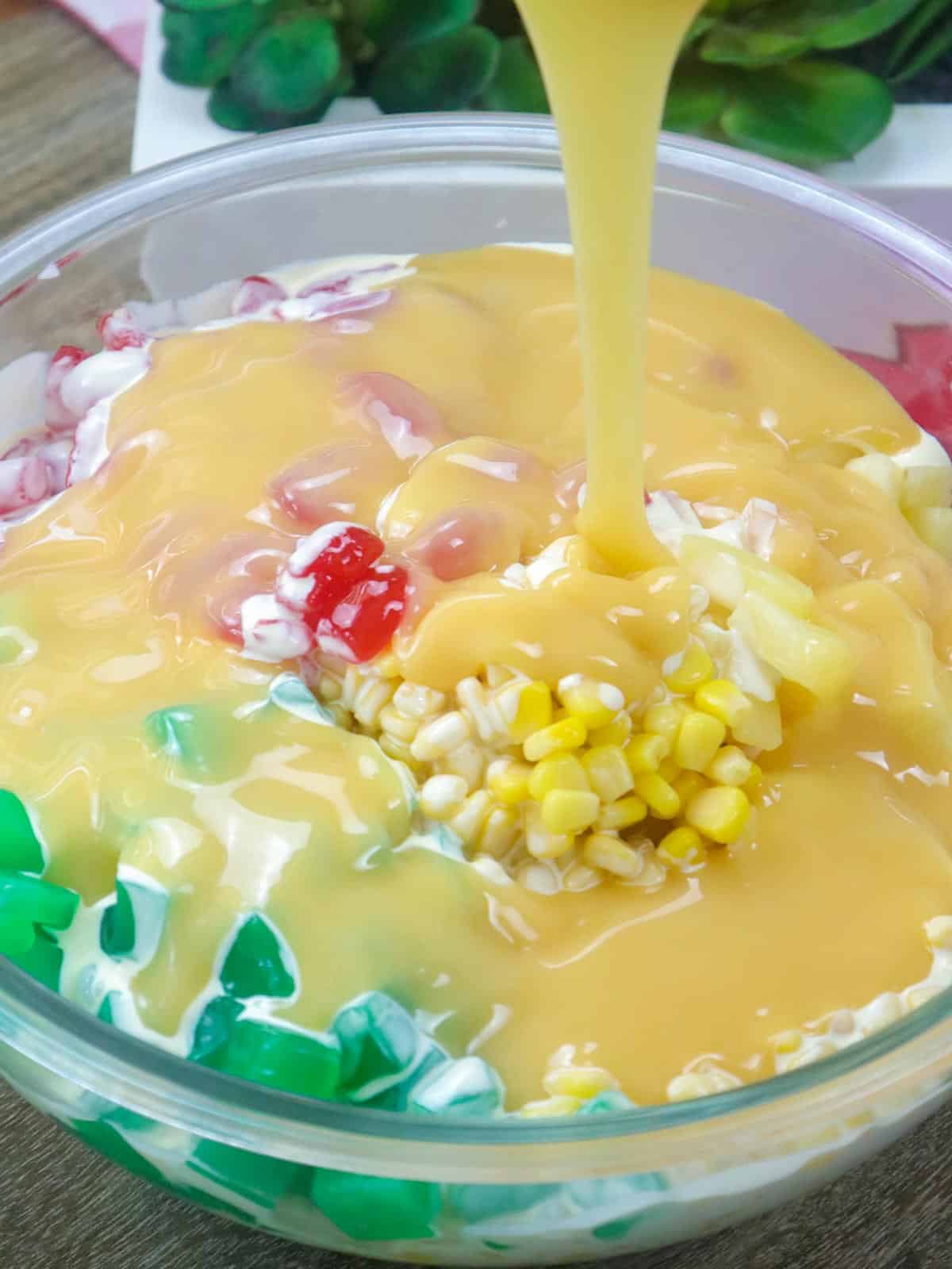 making buko salad in a large bowl