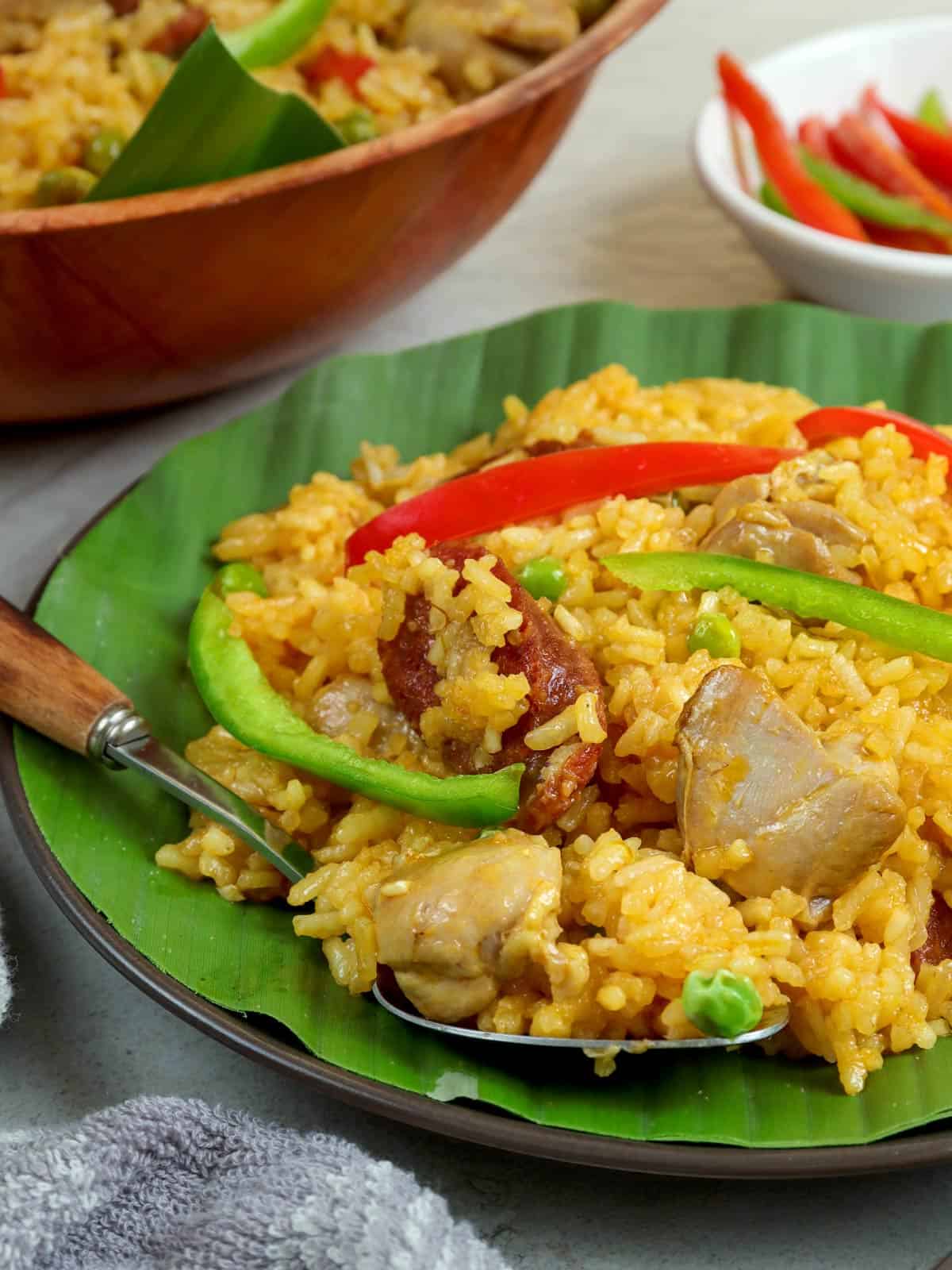 Arroz Valenciana on a banana-lined plate