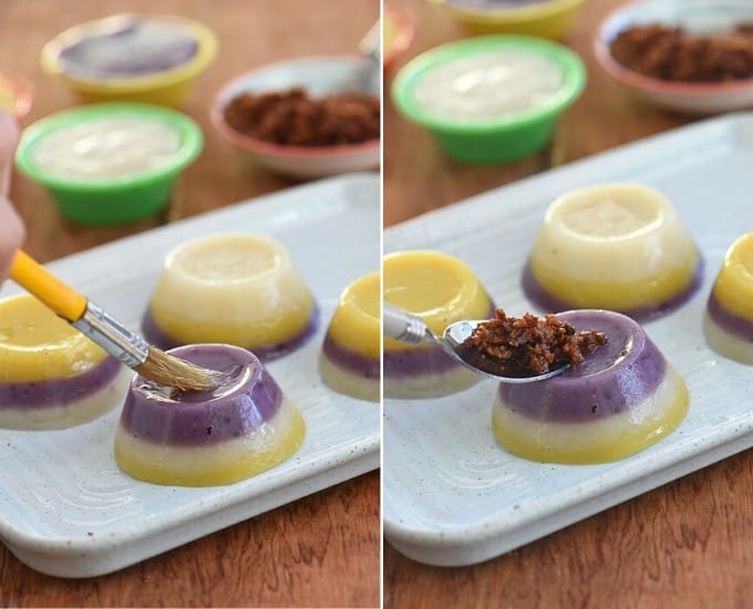 brushing mini sapin-sapin with coconut oil and topping with latik