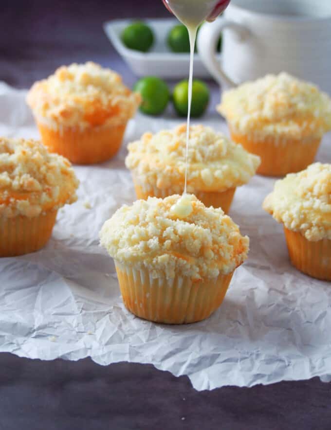 drizzling citrus glaze on calamansi muffins