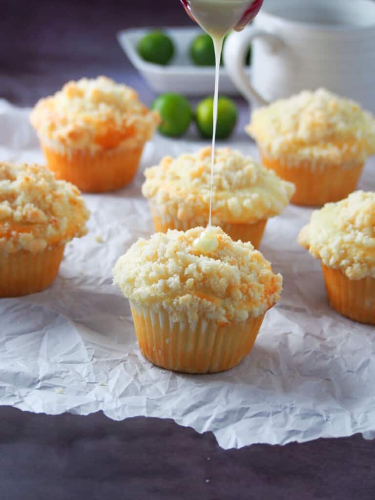 drizzling citrus glaze on calamansi muffins