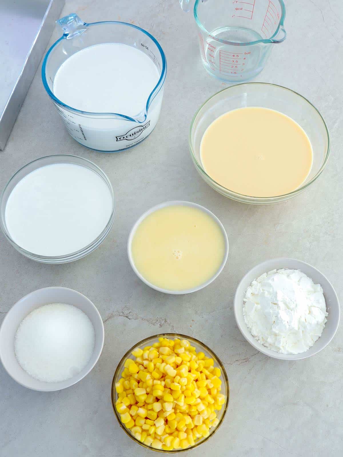 cornstarch, coconut milk, evaporated milk, condensed milk, sugar, corn kernels in bowls