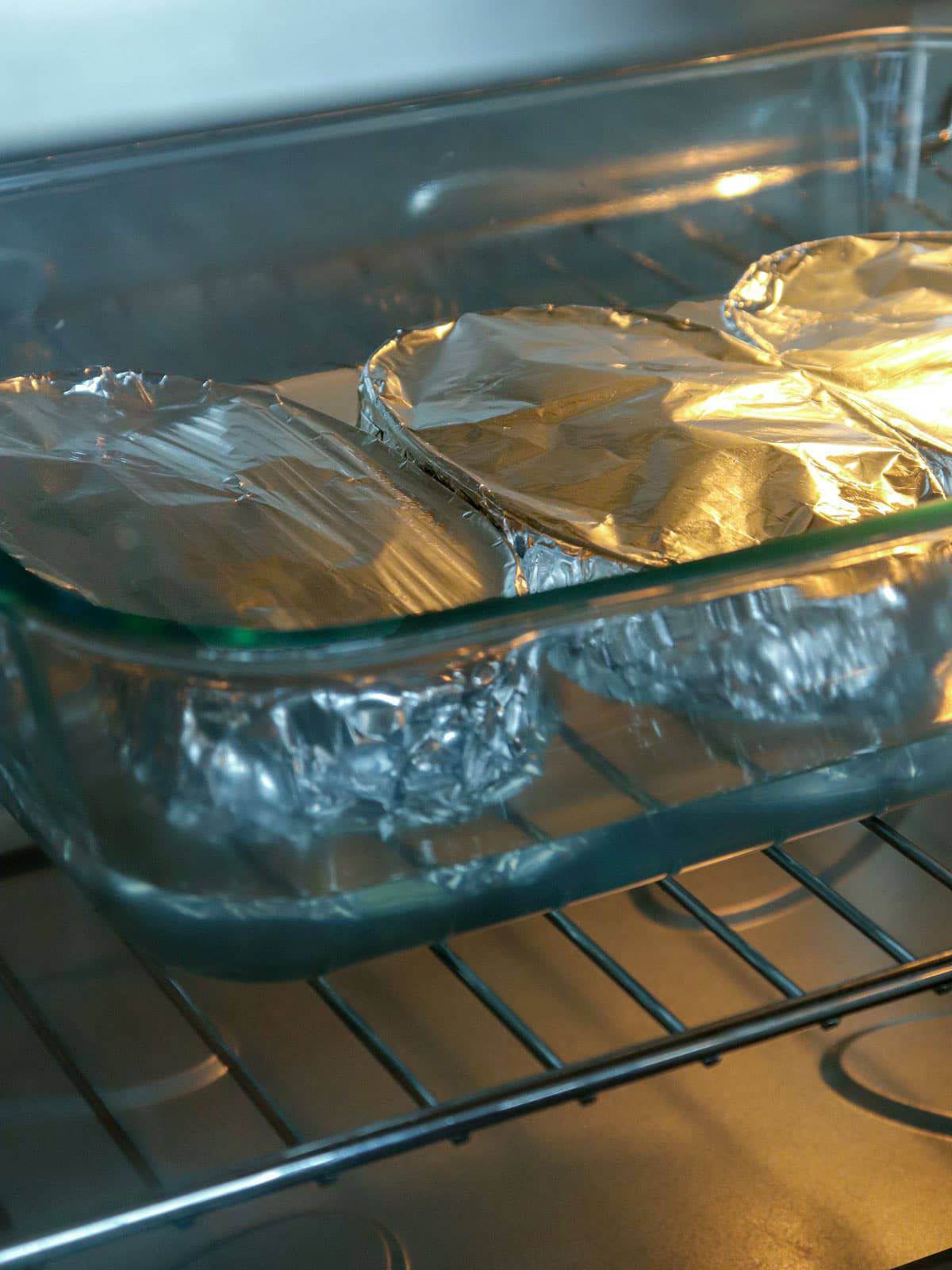 cooking caramel custard in a bain marie in the oven