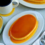 Leche Flan on a white serving platter