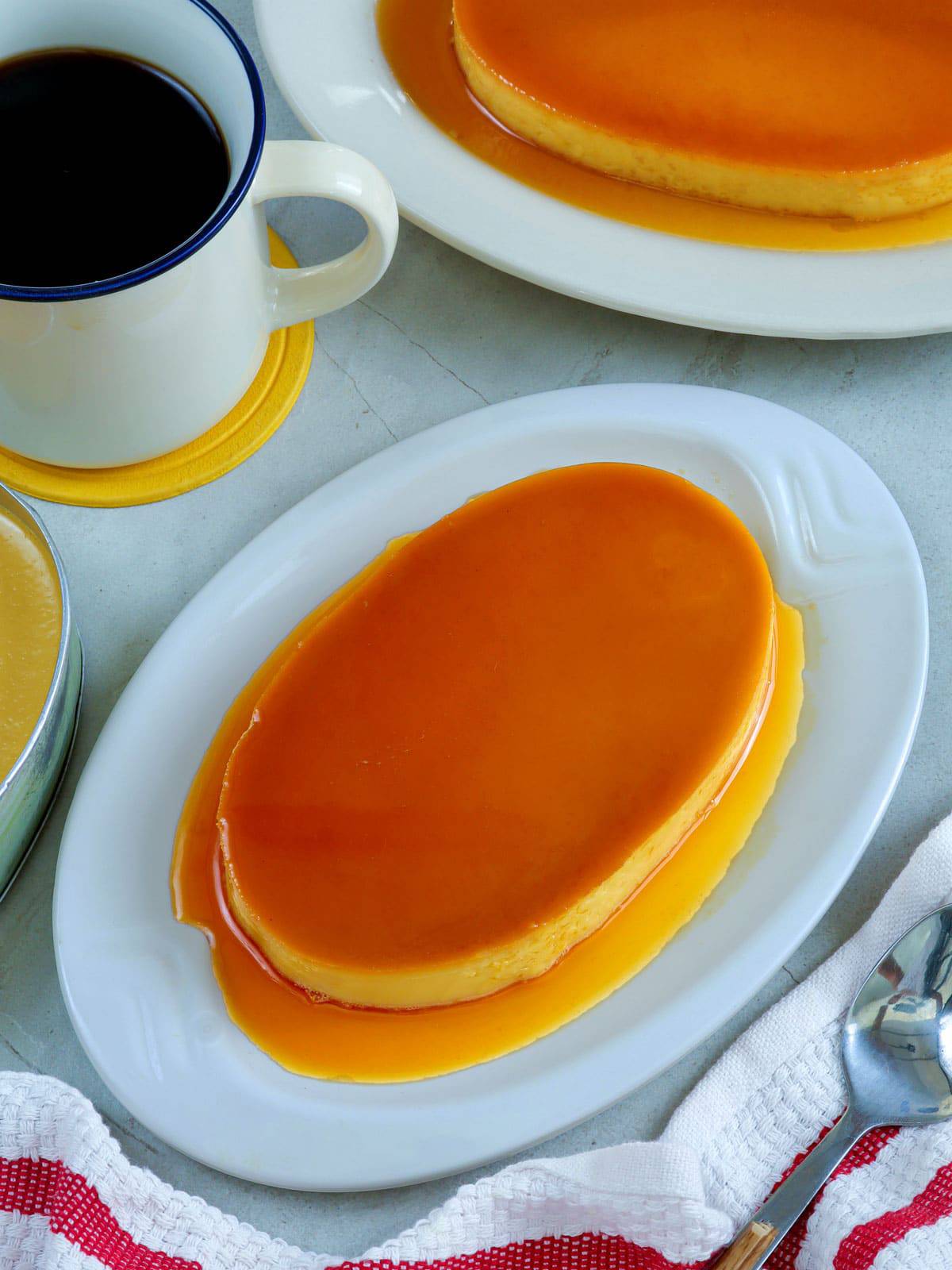 Leche Flan on a white serving platter