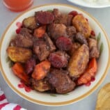 Pork Estofado in a white bowl