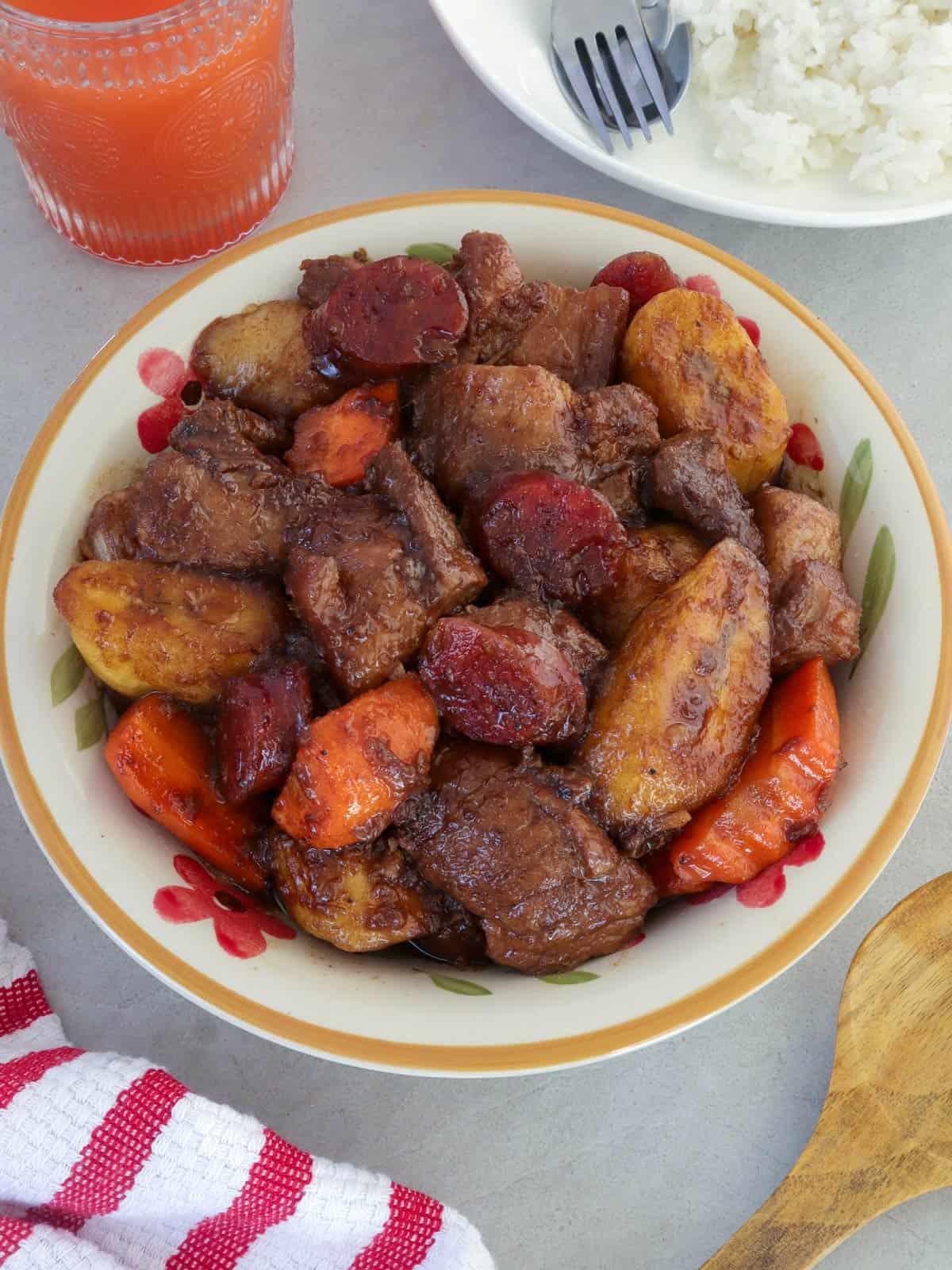 Pork Estofado in a white bowl