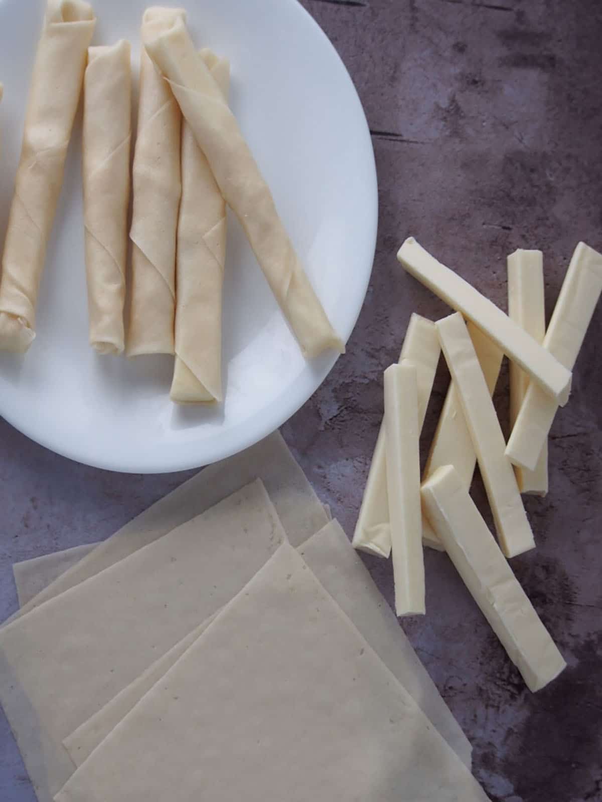 Eden cheese cut into sticks, spring roll wrappers