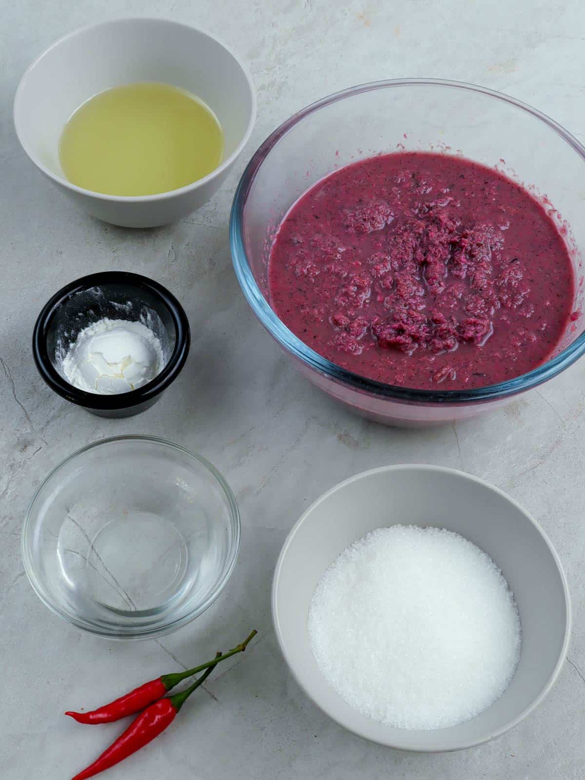 raw alamang, sugar, water, cornstarch, oil in bowls