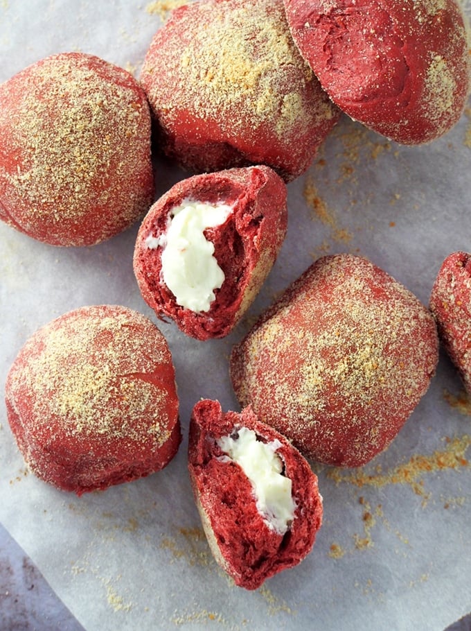 red velvet bread rolls on a parchment paper